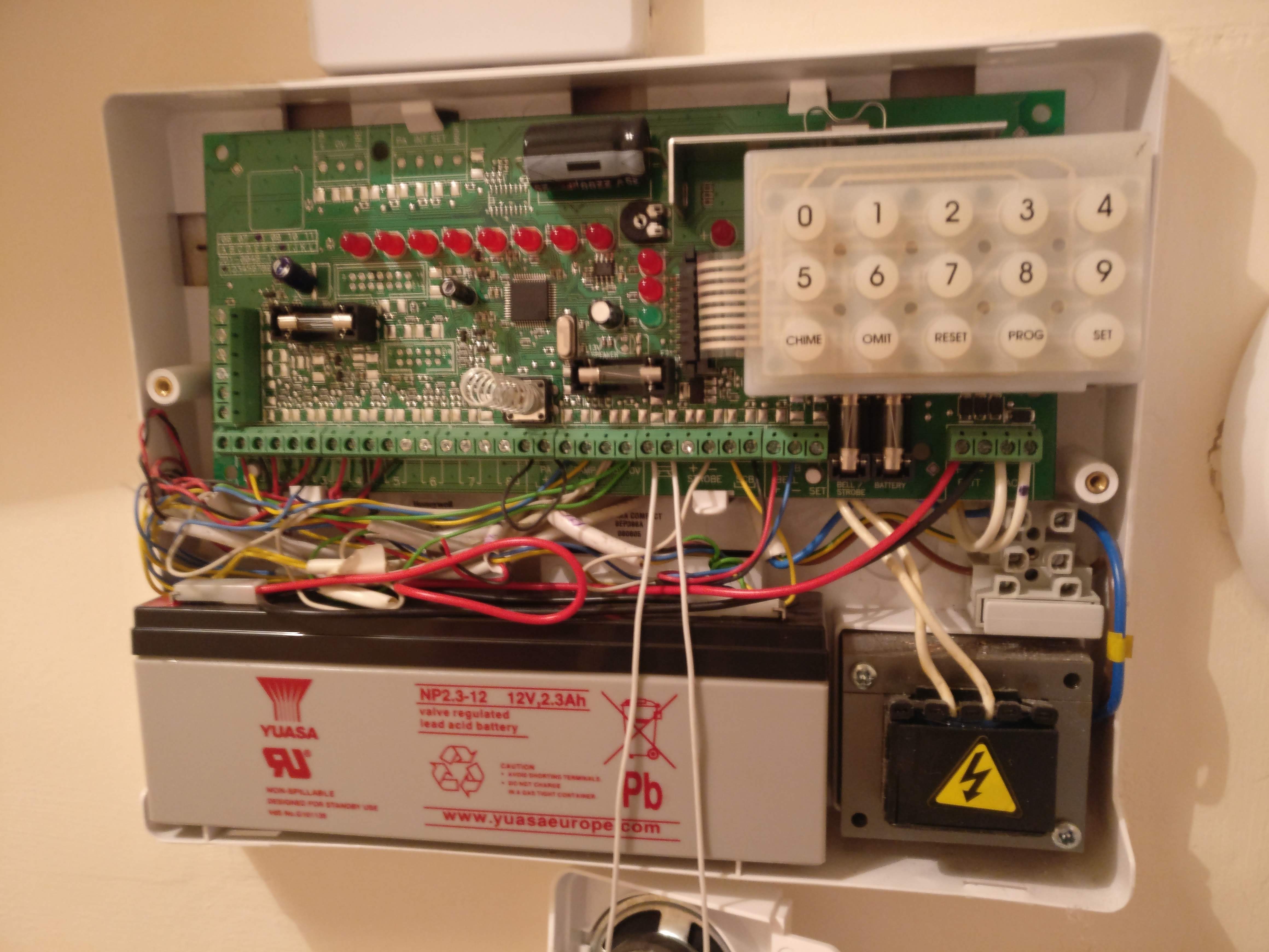 Accenta / Optima alarm box completely opened exposing the components inside