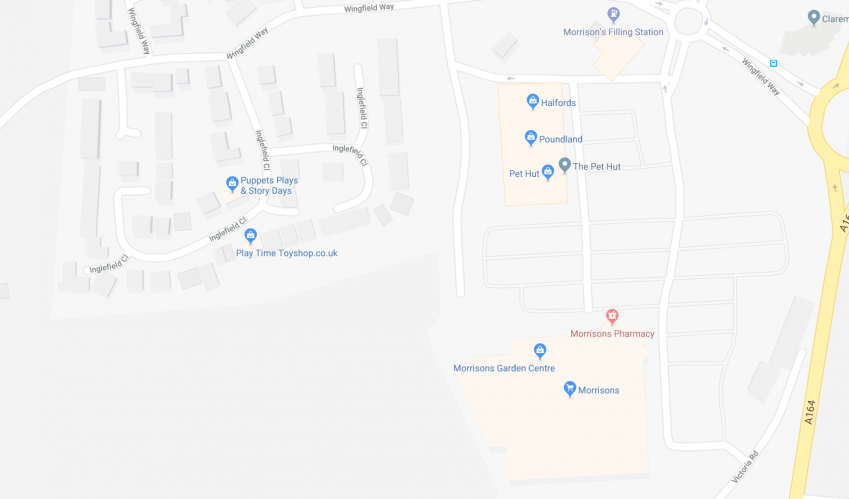 screenshot showing local shops and residential estate on google maps