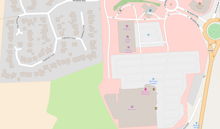 screenshot showing local shops and residential estate on open street map